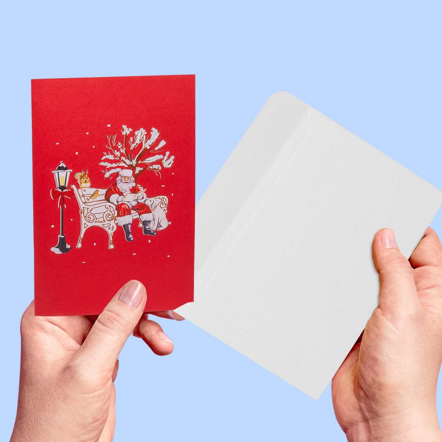 Pop Up Weihnachtskarte 3D - Weihnachtsmann im Park mit Rentier & Tieren, N461