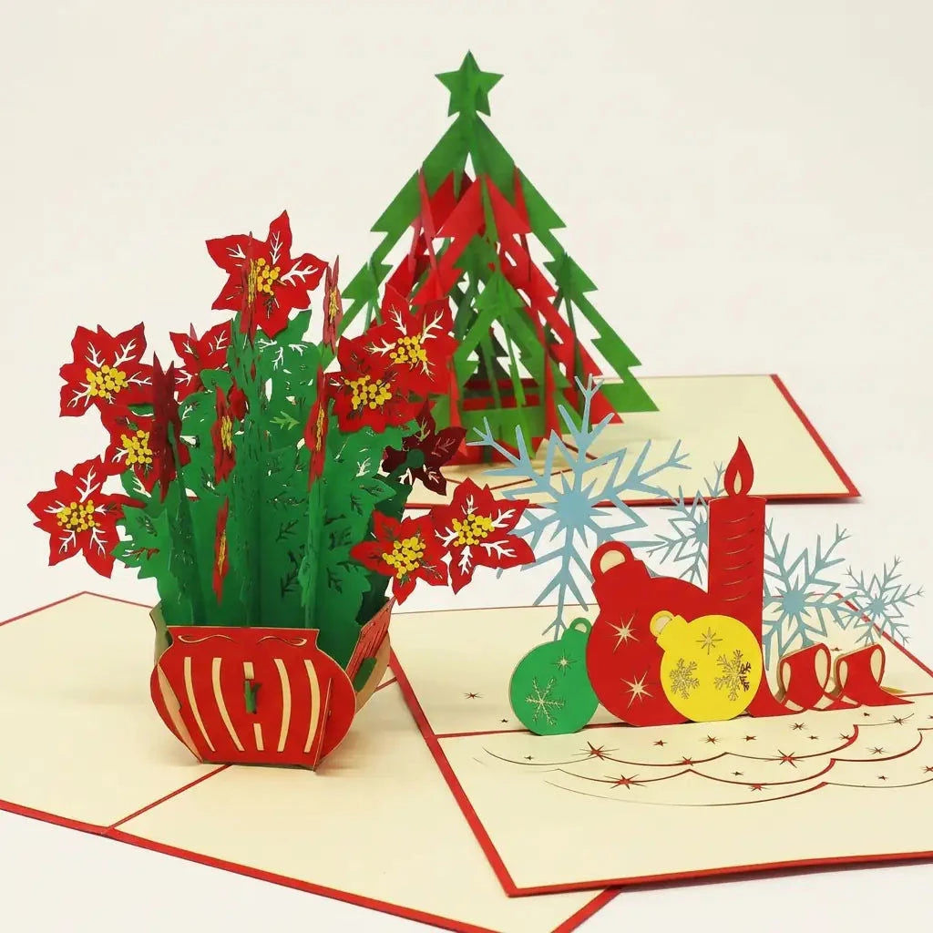 Drei offene Pop-Up-Weihnachtskarten mit modernem Weihnachtsbaum, roten Weihnachtssternen und Kerzenmotiv mit bunten Kugeln