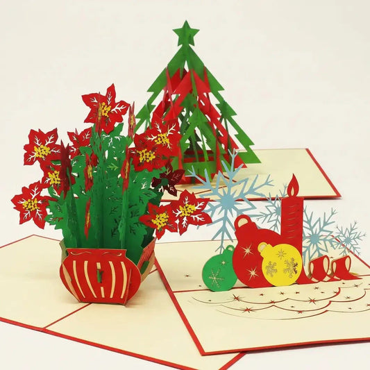 Drei offene Pop-Up-Weihnachtskarten mit modernem Weihnachtsbaum, roten Weihnachtssternen und Kerzenmotiv mit bunten Kugeln