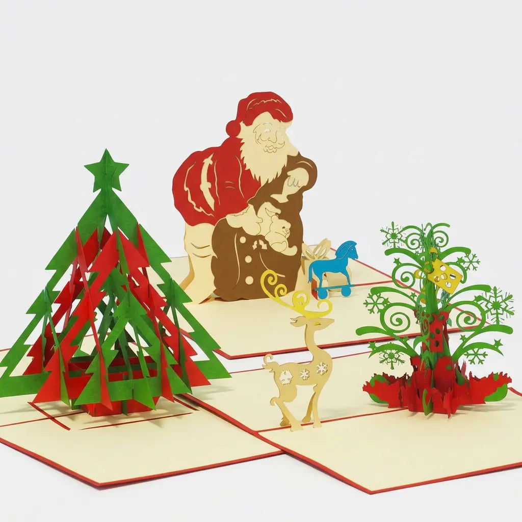 Drei geöffnete LINPopUp Pop-Up-Weihnachtskarten: moderner rot-grüner Tannenbaum, Weihnachtsmann mit Gabensack und verzierter Weihnachtsbaum mit Rentier
