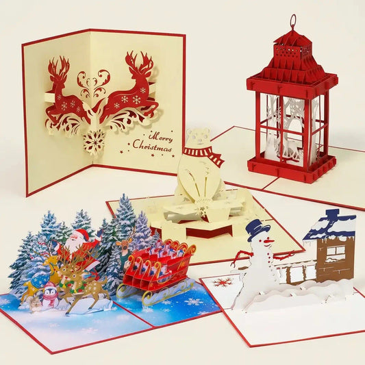 5er-Set Pop-Up-Weihnachtskarten Winterzauber mit Rentierschlitten, Hirschen, Eisbär, Schneemann am Haus und Laterne